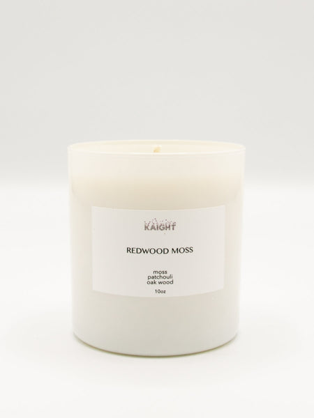 Our Redwood Moss Candle has top notes of Fern and Moss; middle notes of Cedar Wood and Pine and base notes of Firewood and Oak Moss for a fragrant woodsy scent. 100% soy wax with natural cotton wick. Hand poured in Brooklyn. 10 oz. with approx. 60 hour burn time. Packaged in a beautiful white box that makes these ideal for gifting.